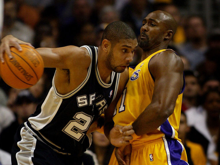 Tim Duncan passes Karl Malone on NBA's alltime rebounding list
