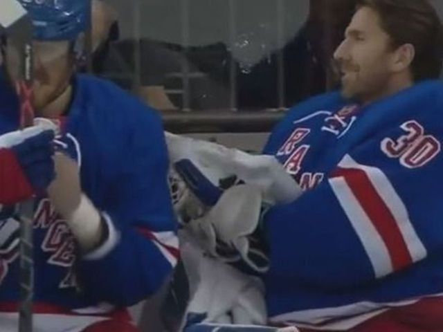VIDEO: Lundqvist makes glove save ... from the bench