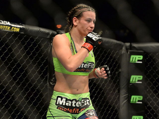 VIDEO: Miesha Tate puts Holly Holm to sleep with vicious rear-naked choke