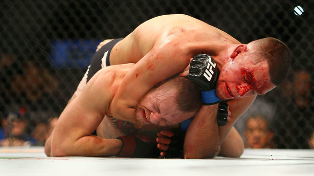 Diaz shocks McGregor with 2nd-round submission at UFC 196
