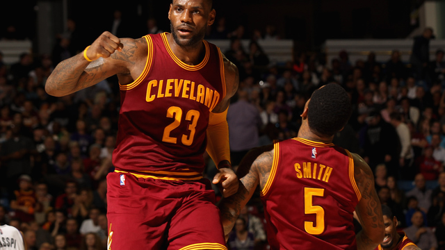 VIDEO: LeBron finishes J.R. Smith's rainbow alley-oop
