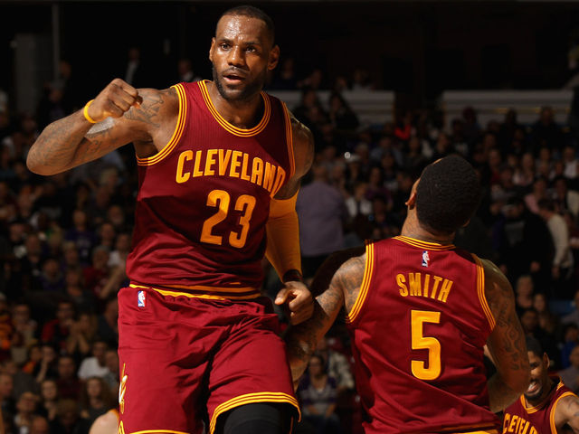 VIDEO: LeBron finishes J.R. Smith's rainbow alley-oop