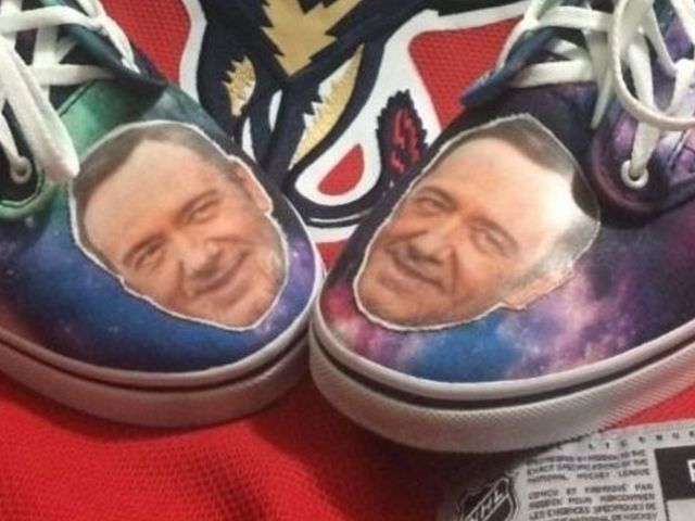 Panthers fan's shoes are out of this world