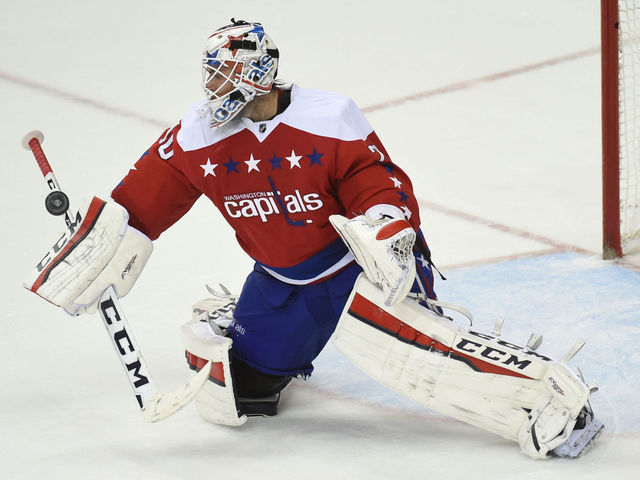 Holtby sets Capitals record in playoff-clinching win