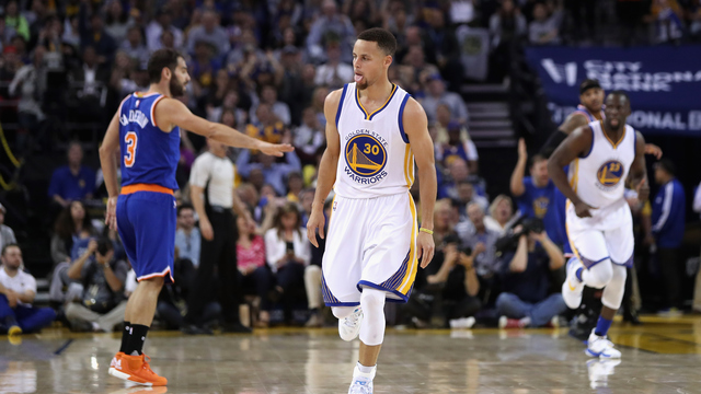 VIDEO: Stephen Curry fakes Calderon, camera operator