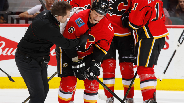 Flames' Wideman injured in post-goal collision