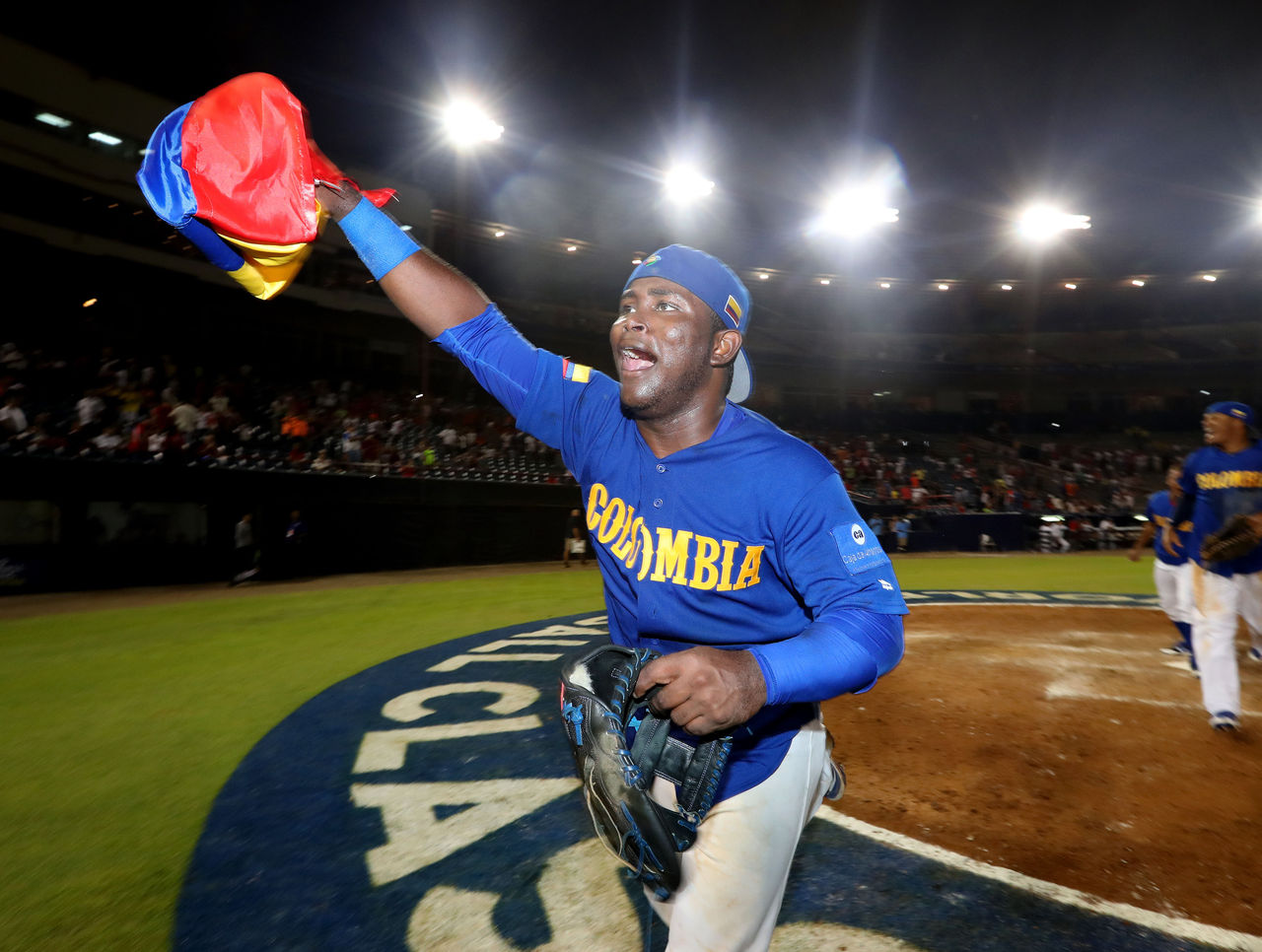 Colombia's Dilson Herrera cranks a home run against Great Britain, 7-4