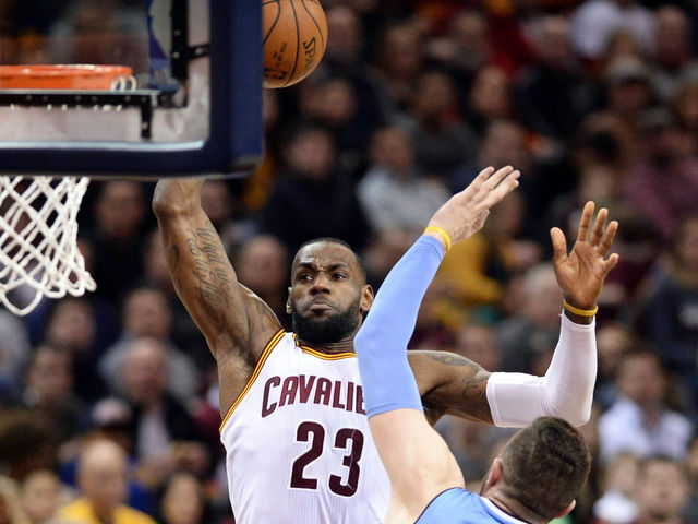 James notches 2nd triple-double as Cavs clinch Central