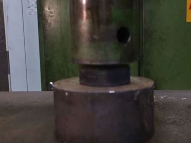 VIDEO: Here's a hockey puck being crushed by a hydraulic press