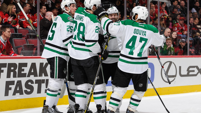Stars clinch playoff spot with another romp over Blackhawks