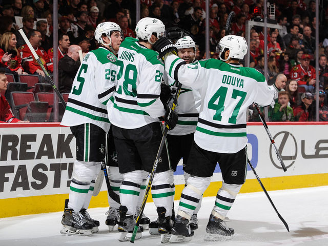 Stars clinch playoff spot with another romp over Blackhawks