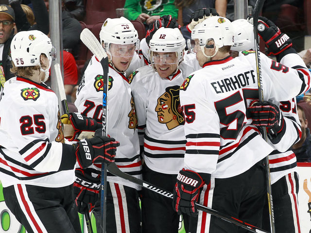 Blackhawks clinch 8th straight playoff berth with win over Canucks