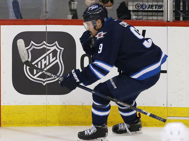 VIDEO: Jets' Copp splits Wild defense, tucks it through Dubnyk