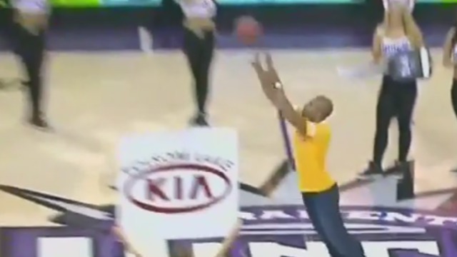 VIDEO: Kings fan hits half-court shot to win car