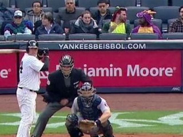 Purple and green dragons attend Yankees game