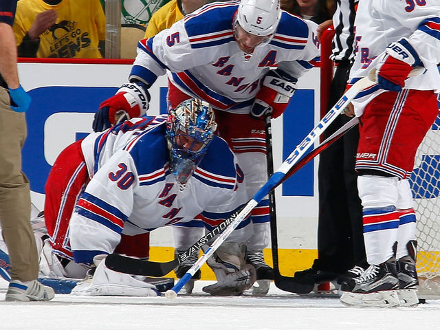 Lundqvist forced from series opener after inadvertent high stick, day to day