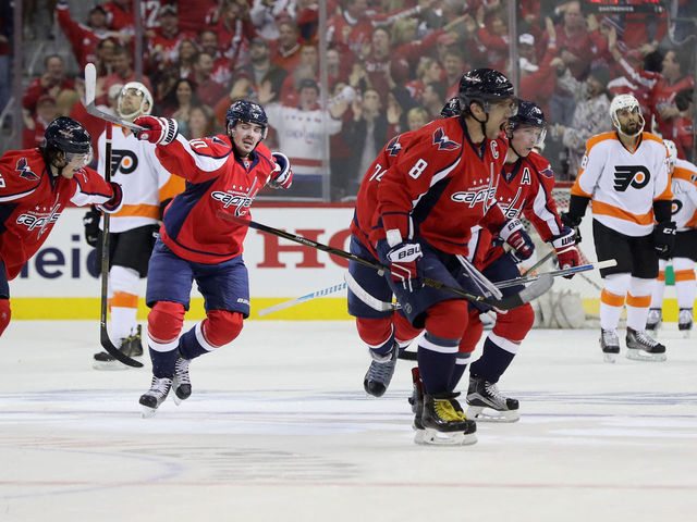Backstrom tees up Ovechkin with threaded feed through Oshie's legs