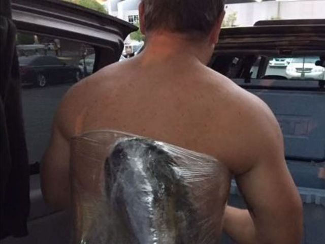 Watch: Predators fans strap catfish to their backs, hurl them on ice
