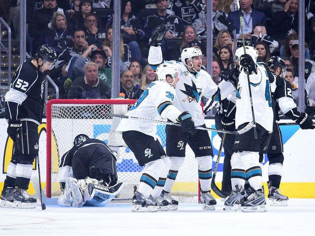 Sharks blow 3-goal lead, but rally to eliminate Kings