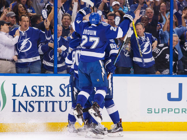 Watch: Lightning's Drouin slides 1st-career playoff goal past Greiss