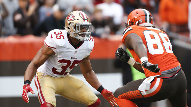 49ers' Reid kneels during national anthem
