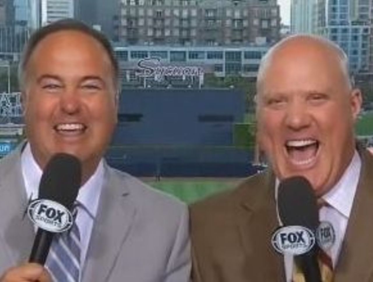 Don Orsillo and Mark Grant have a good laugh together 