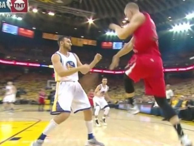 Warriors' Bogut takes a saved ball off a tender area