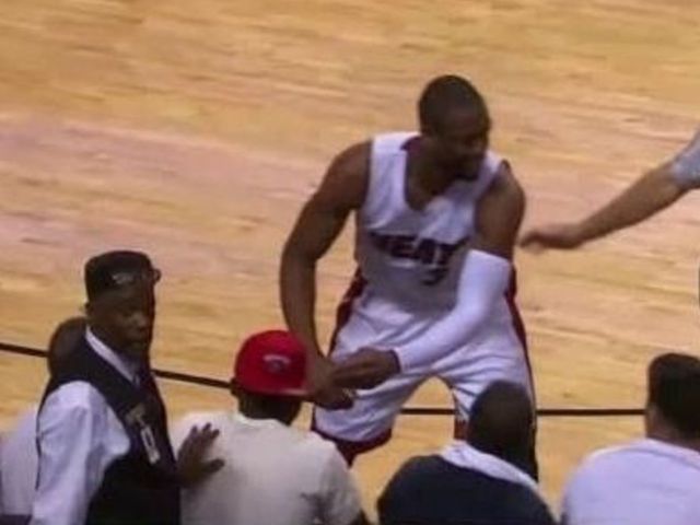 Wade trolls Oladipo after crashing into him courtside