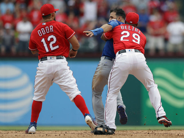 Watch: Odor punches Bautista after slide, triggers brawl