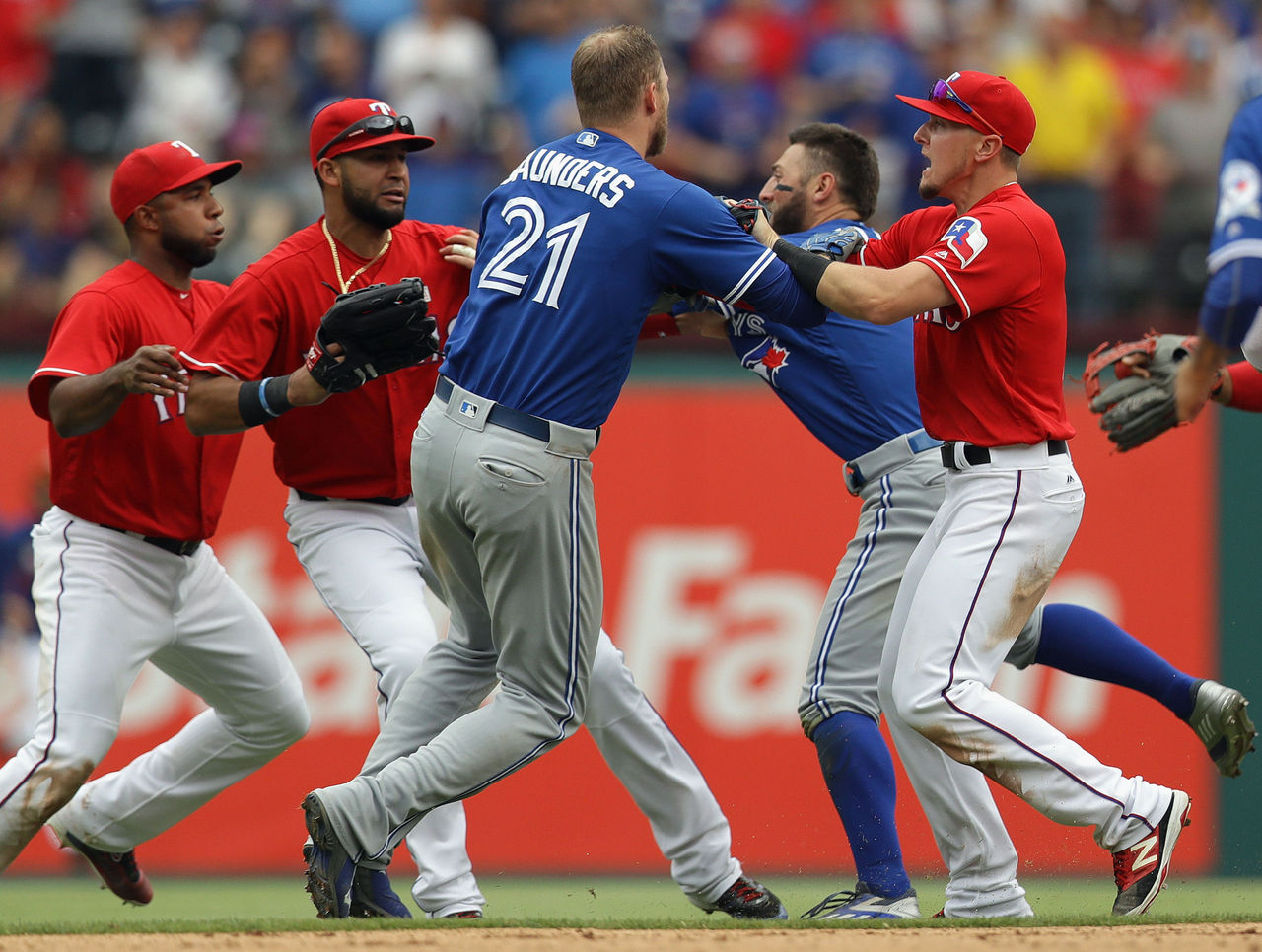 Rougned Odor suspended eight games for punching Jose Bautista