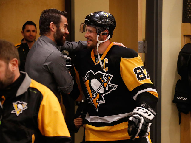 Crosby and Dupuis embrace after OT winner