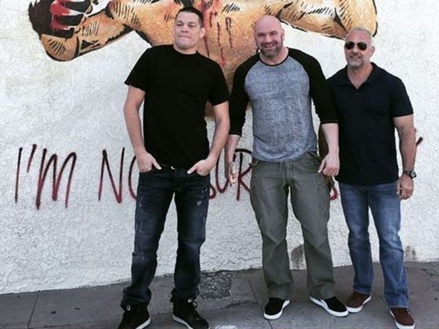 Nate Diaz poses with UFC execs after reports of tense meeting