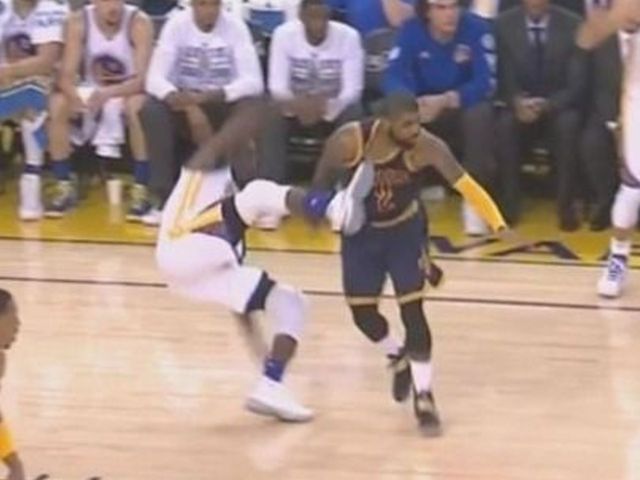 Green kicks Irving in chest while falling backward