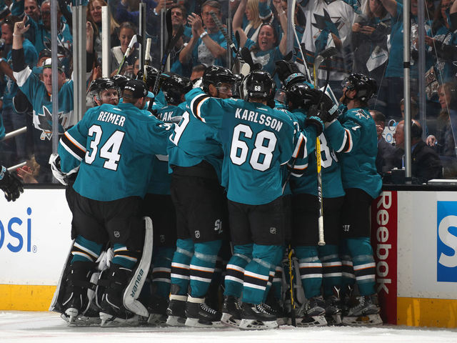 Sharks avoid dubious distinction with 1st OT win of playoffs