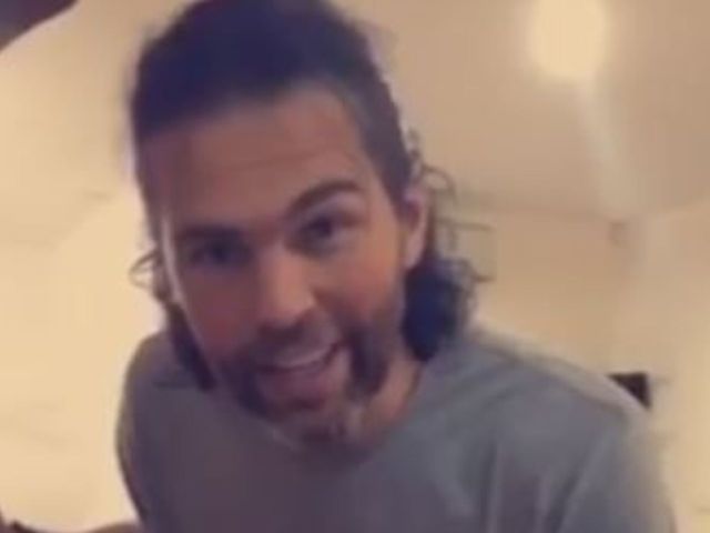 Jagr dances while holding hockey stick