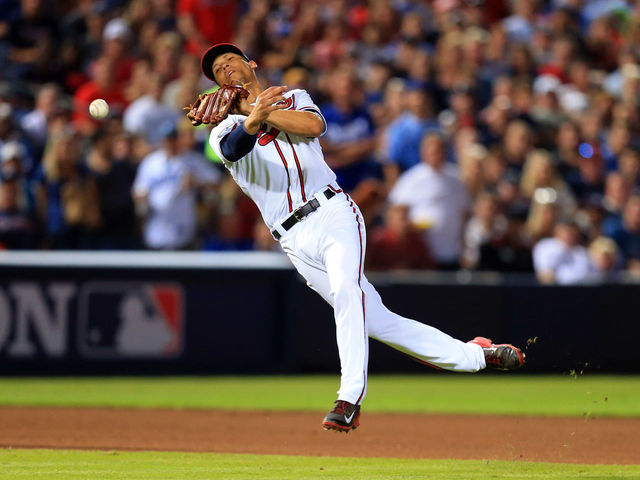 VIDEO: Braves' Simmons makes impossible play, impossible throw
