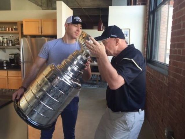 Ian Cole's dad drinks coffee out of the Stanley Cup