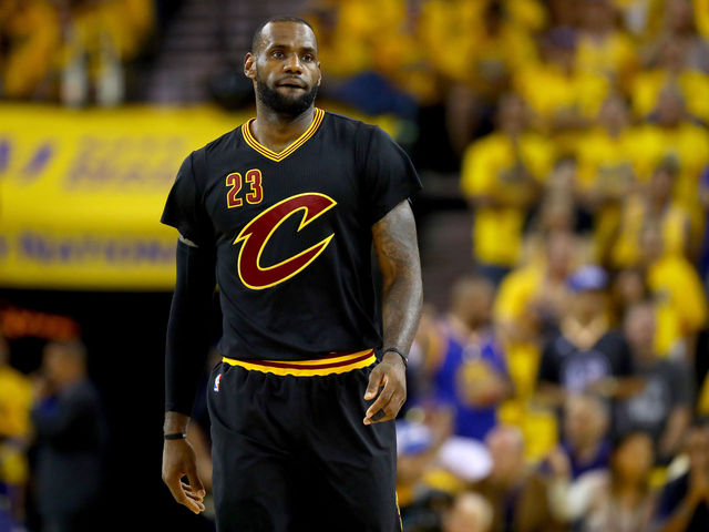 LeBron finishes with triple-double in season opener