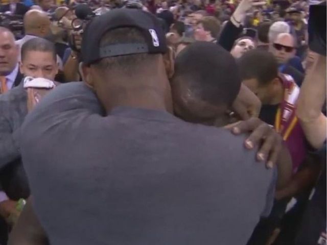 Watch: LeBron shares embrace with Draymond