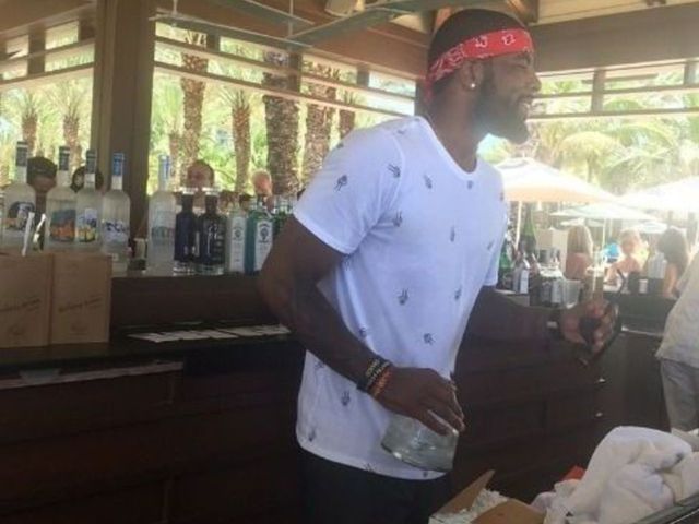 Kyrie DJs, bartends in the Bahamas