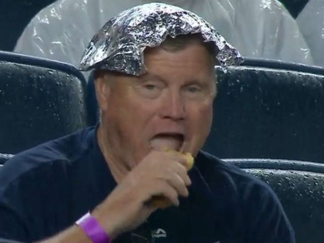 Yankees fan finds unique shelter from rain