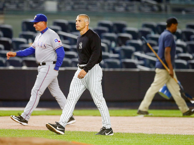 Girardi: Players put at risk during rain-soaked game