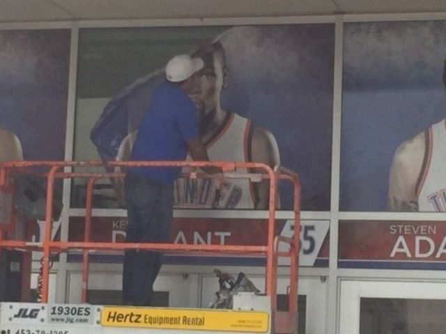 Thunder take down Durant poster at Chesapeake Energy Arena