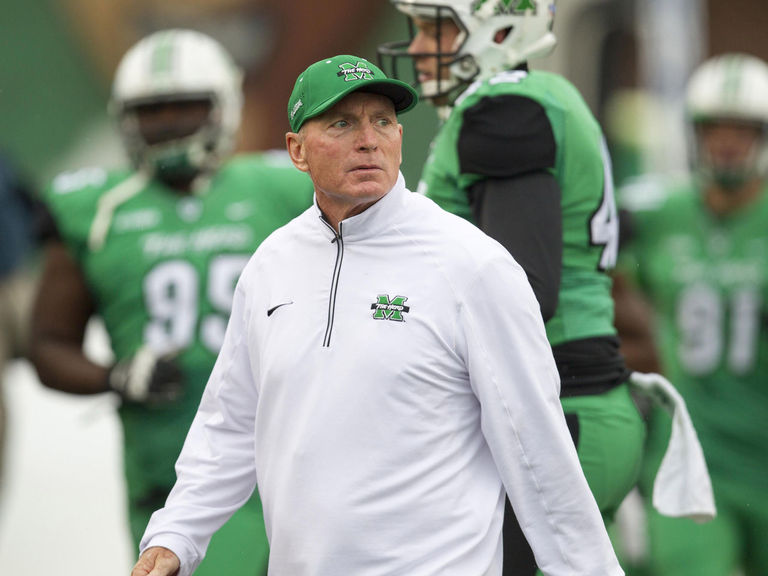 Report West Virginia Governor trying to get Marshall to fire head