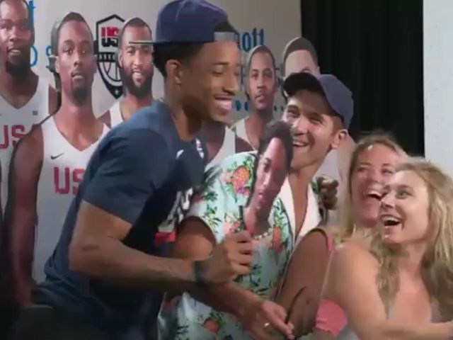 DeRozan surprises fans taking photos with Team USA cutouts