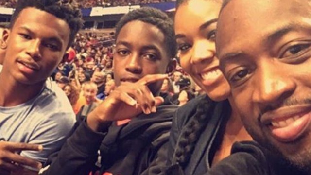 Wade takes in USA-Venezuela courtside with family
