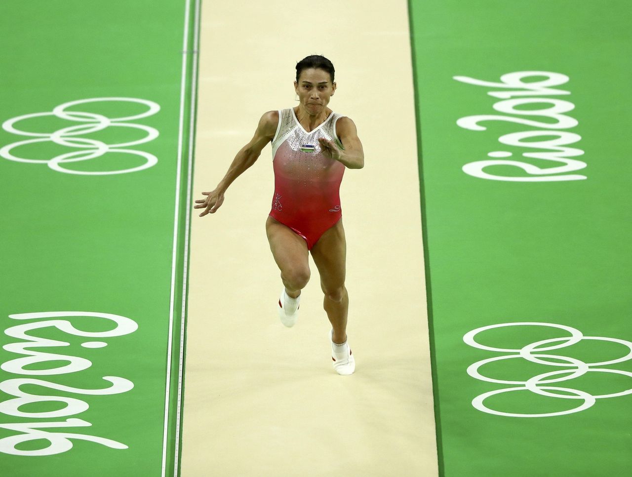 41-year-old gymnast breaking records, keeping pace with ...