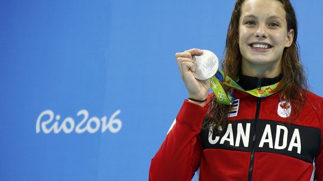 Canada's Oleksiak claims 2nd medal with silver in 100m butterfly
