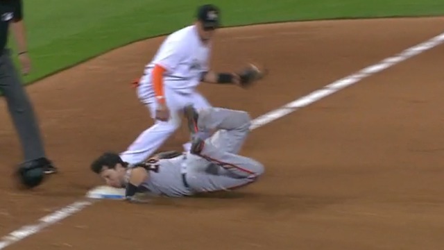 Watch: Posey faceplants into third base