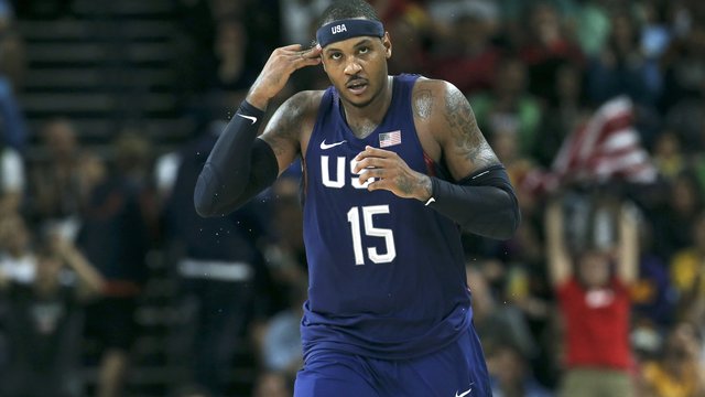 Melo carries U.S. past Australia to avoid mammoth upset